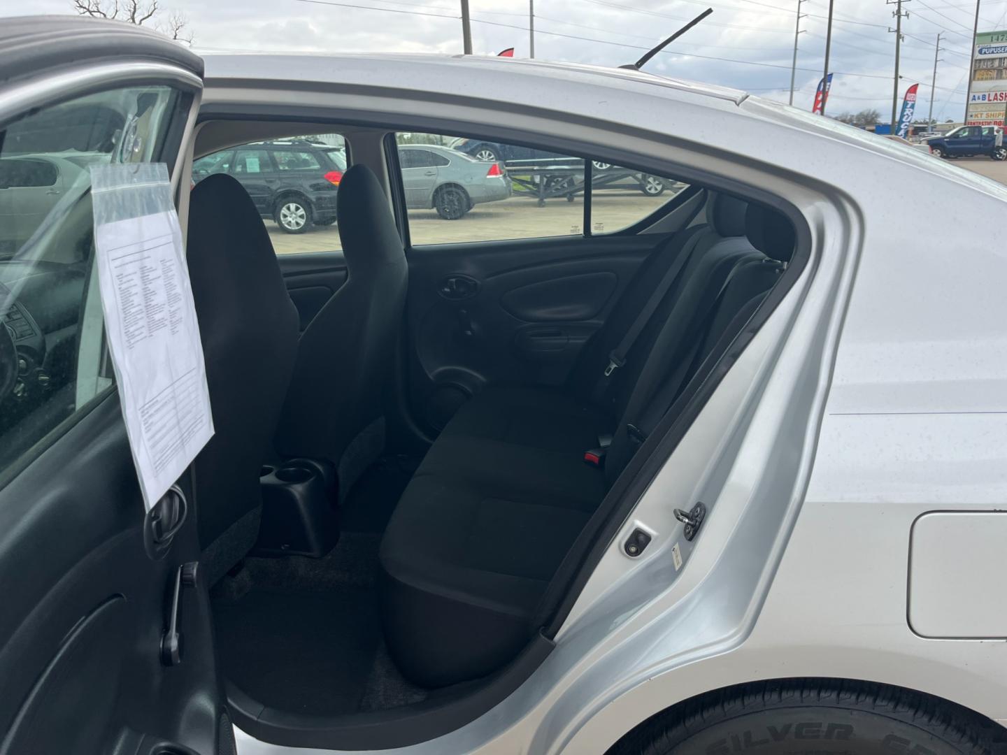 2014 SILVER /black Nissan Versa 1.6 S 5M (3N1CN7AP3EL) with an 1.6L L4 DOHC 16V engine, 5-Speed Manual transmission, located at 14700 Tomball Parkway 249, Houston, TX, 77086, (281) 444-2200, 29.928619, -95.504074 - Photo#9